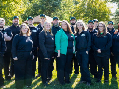 The Pest Pros of Michigan team, smiling and posing for a group photo.
